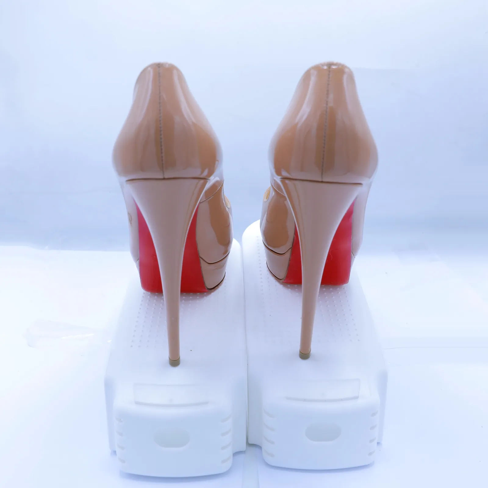 Christian Louboutin Nude Patent Leather Pumps