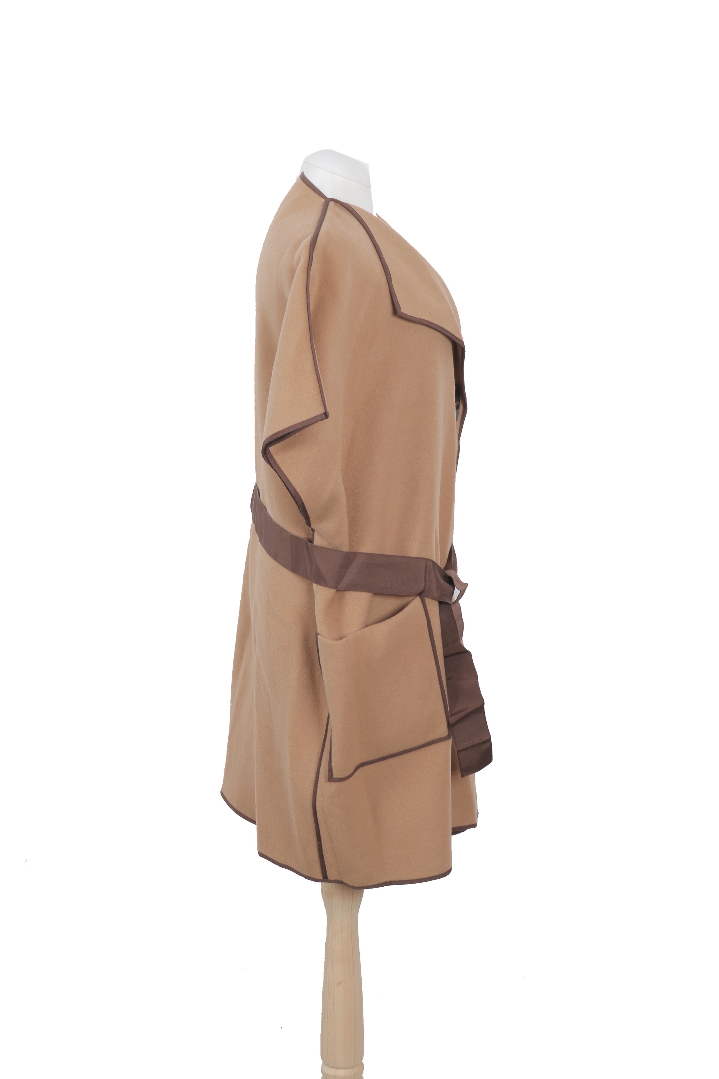 Carolina Herrera sleeveless wrap coat in camel wool with contrasting brown trim