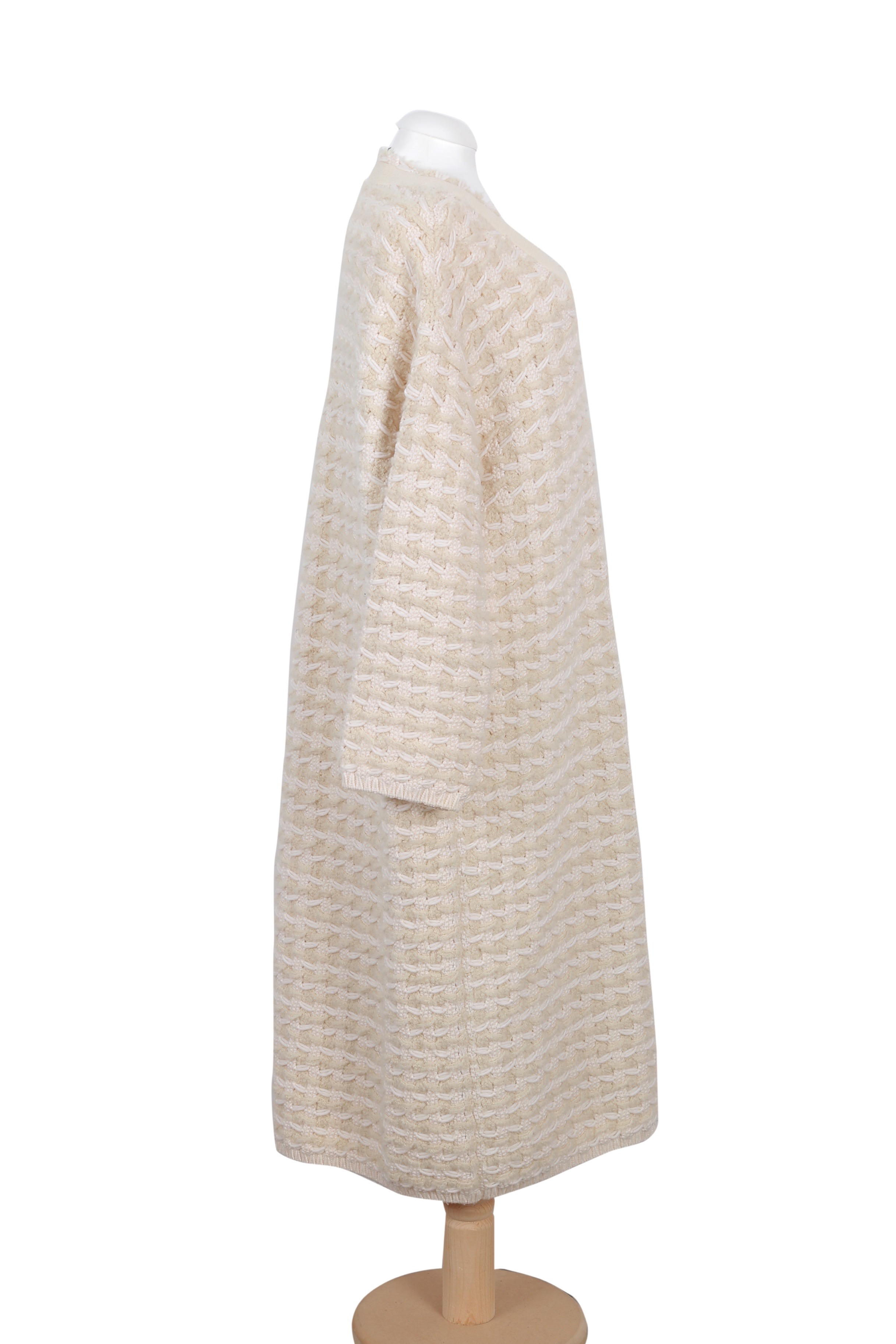 Sonia Rykiel beige knitted midi dress featuring a deep V-neckline and relaxed silhouette
