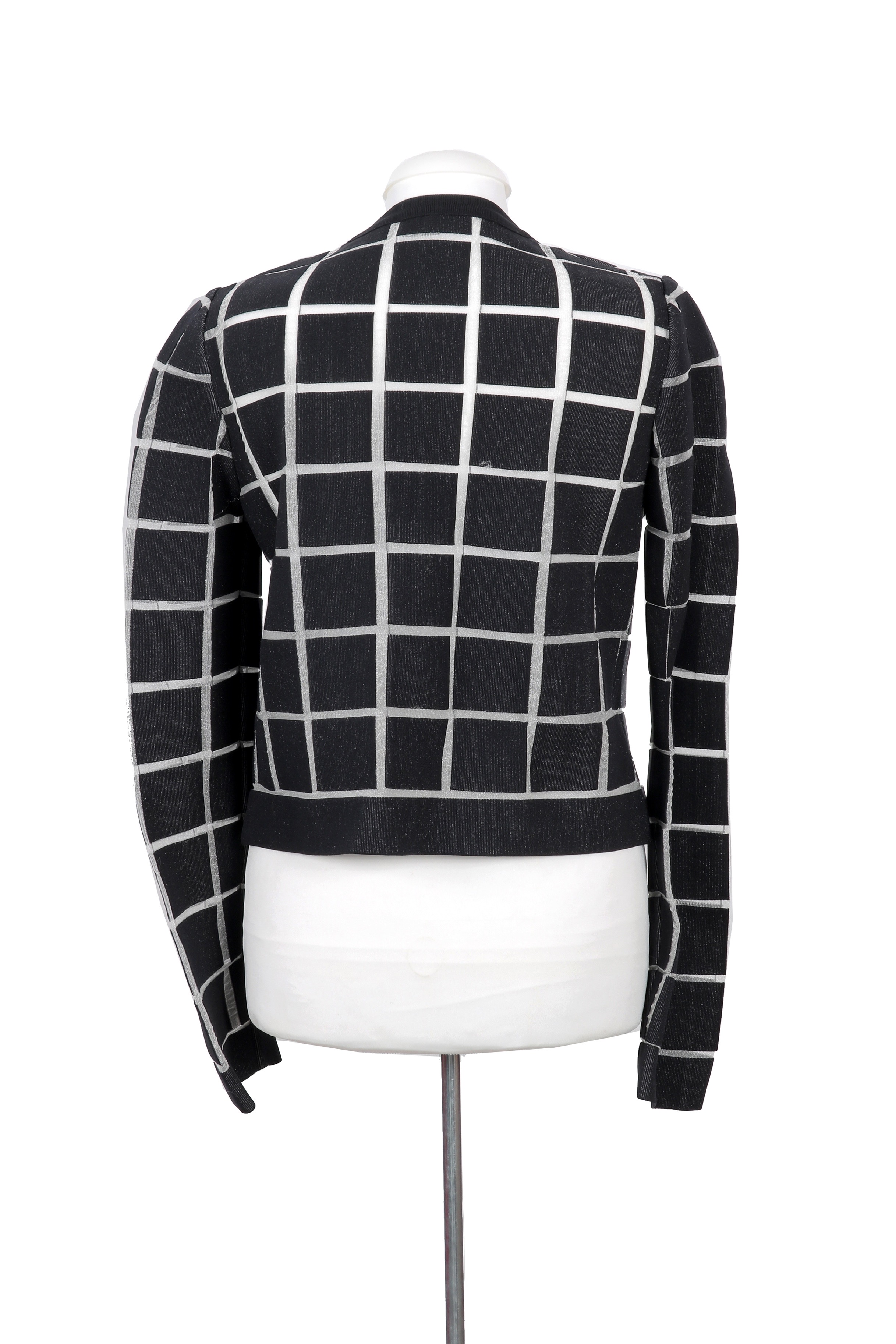 A Balenciaga jacket featuring a bold black-and-white windowpane check pattern