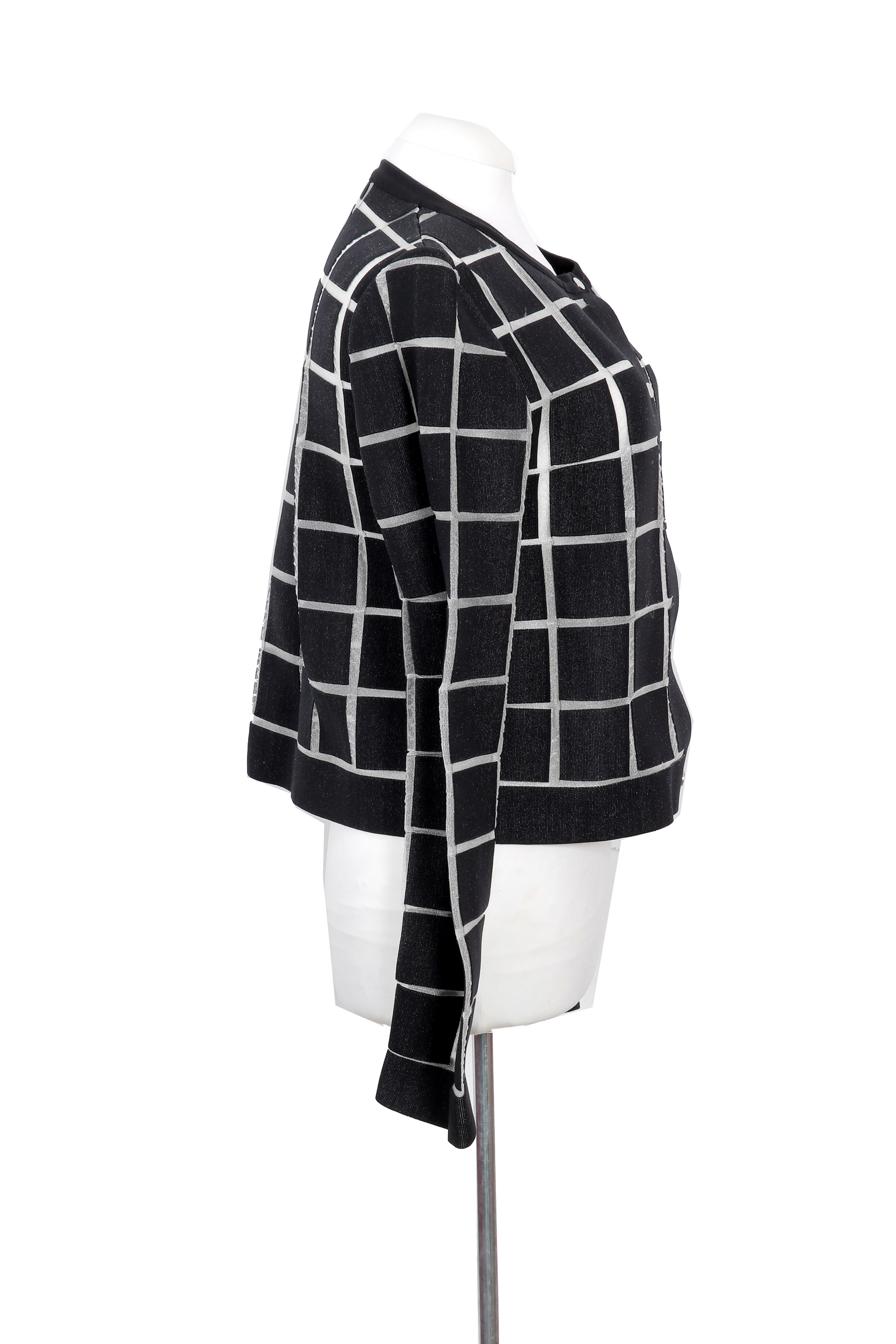 A Balenciaga jacket featuring a bold black-and-white windowpane check pattern