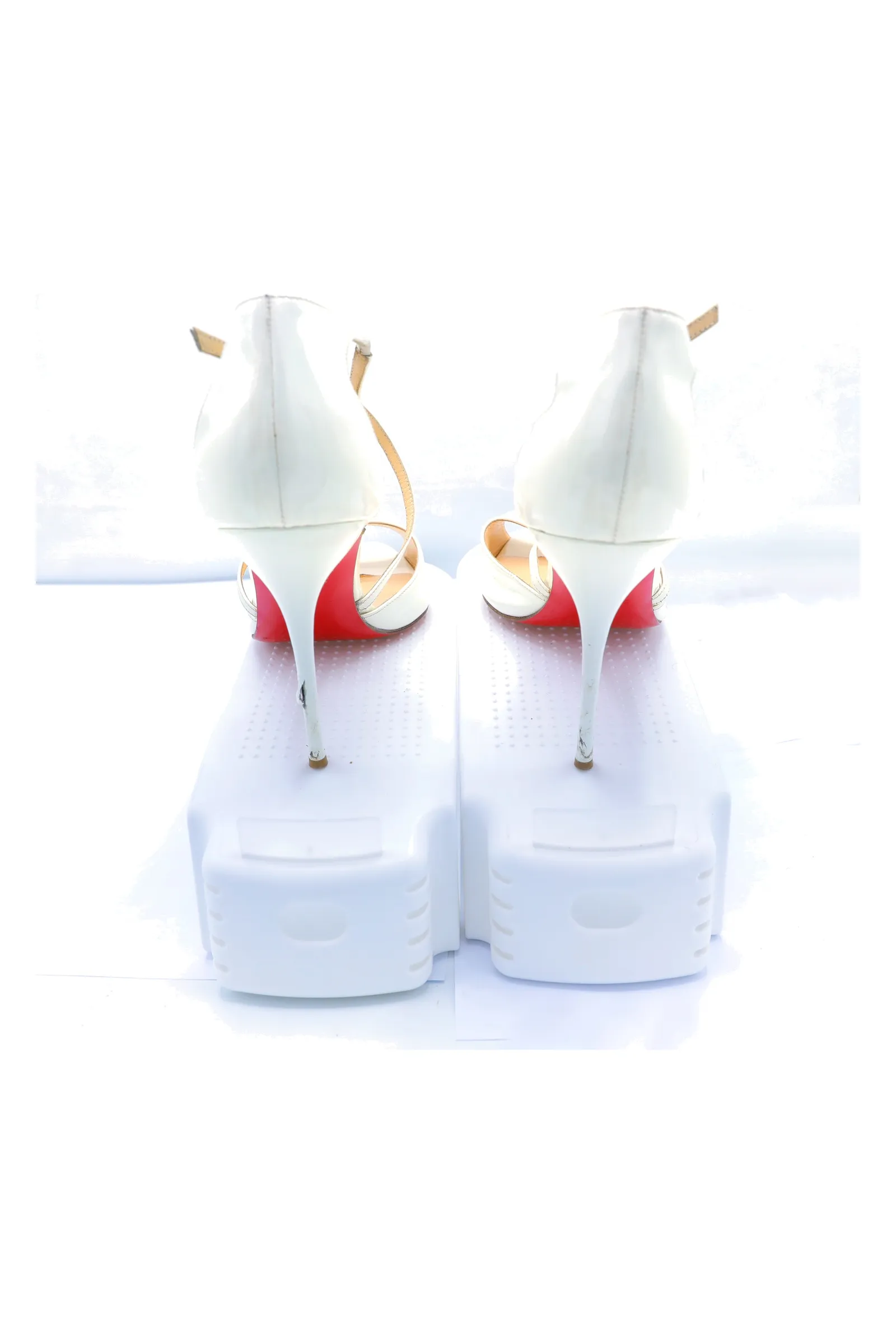 Christian Louboutin White Patent Leather Pumps