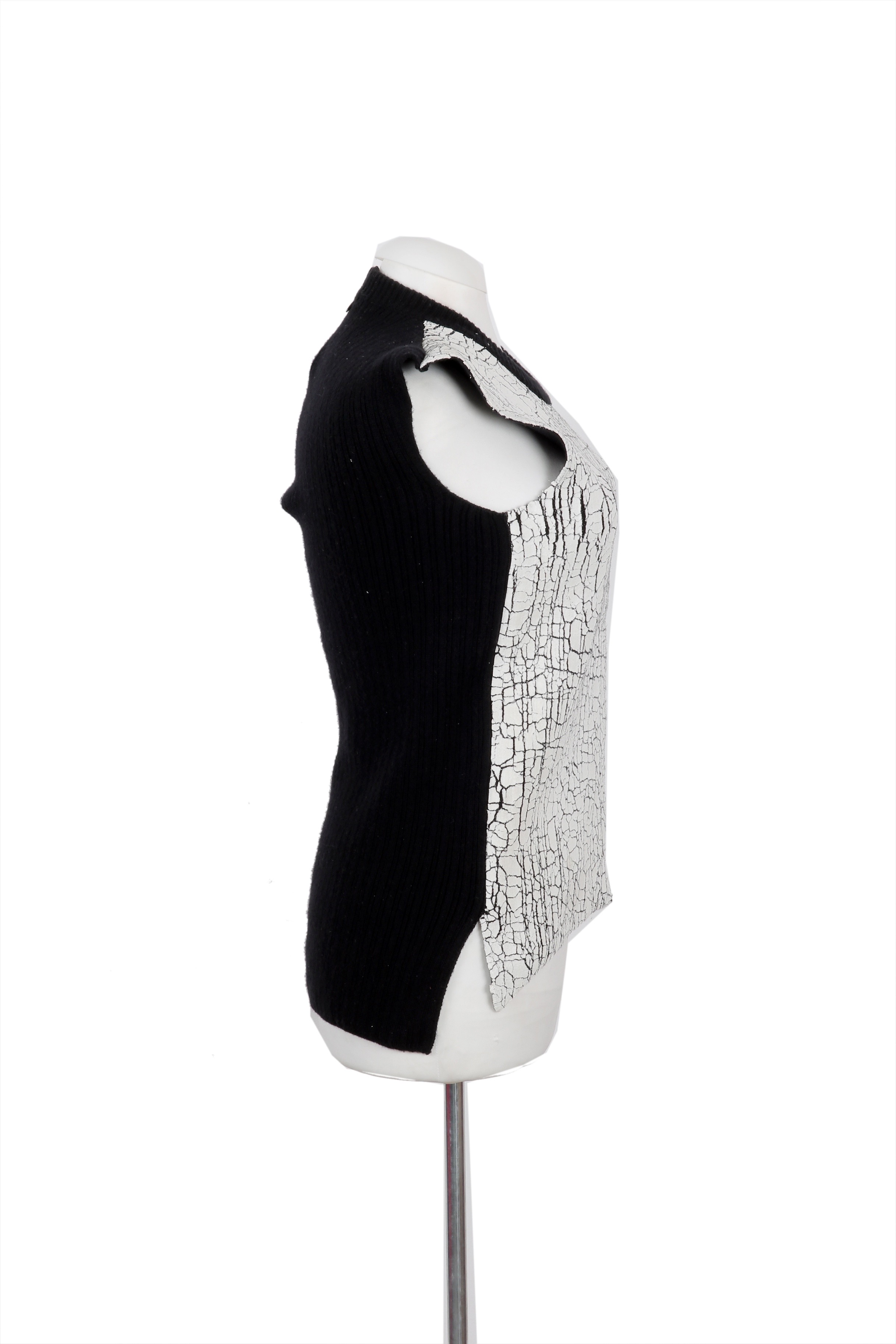 Balenciaga sleeveless sweater vest featuring a white cracked-paint effect with a modern, artistic finish