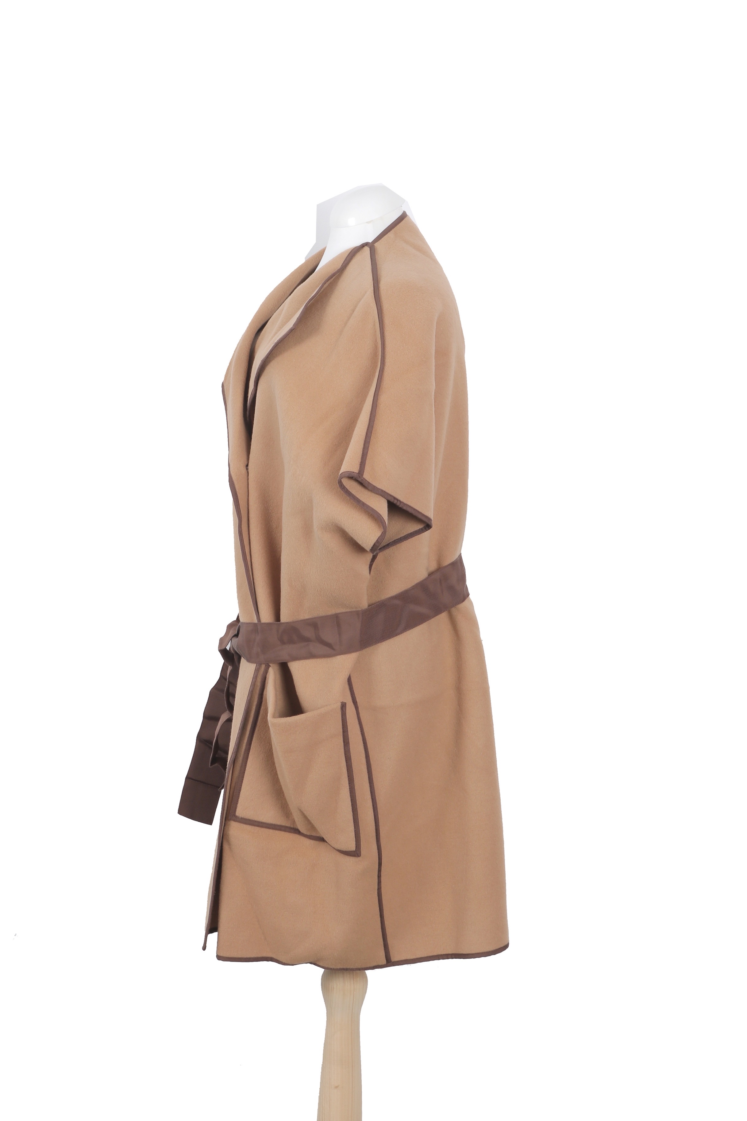 Carolina Herrera sleeveless wrap coat in camel wool with contrasting brown trim
