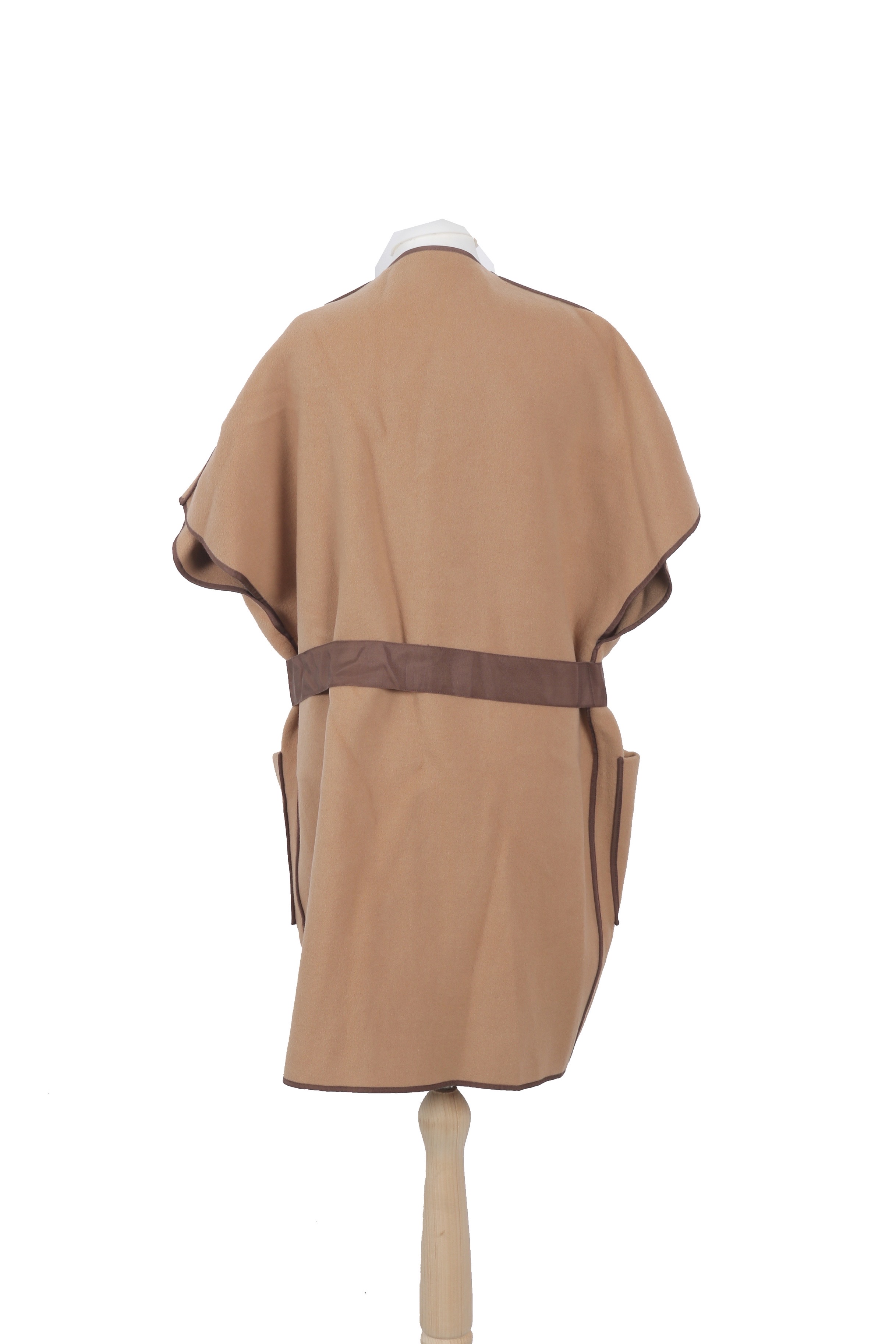 Carolina Herrera sleeveless wrap coat in camel wool with contrasting brown trim
