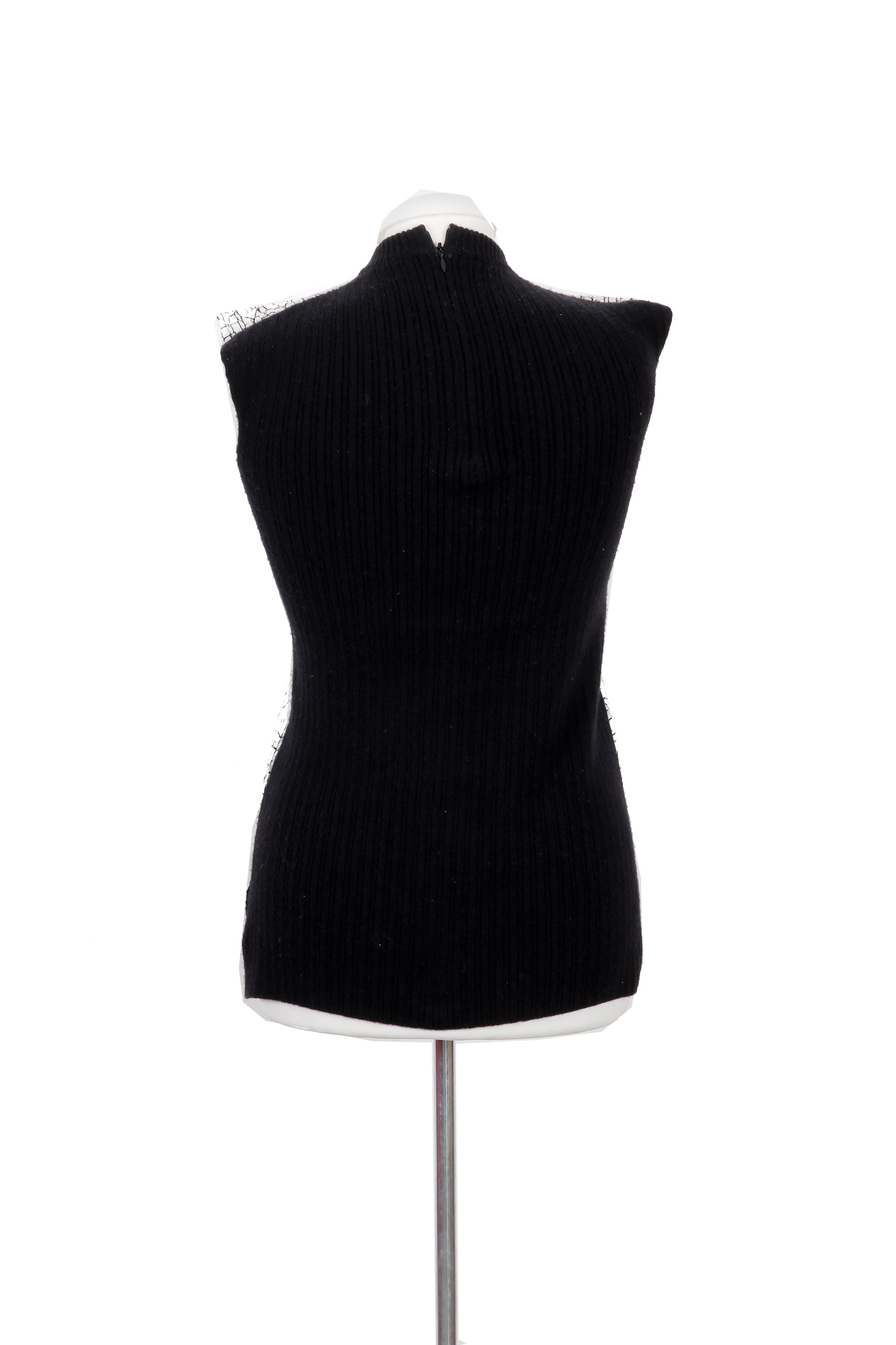 Balenciaga sleeveless sweater vest featuring a white cracked-paint effect with a modern, artistic finish