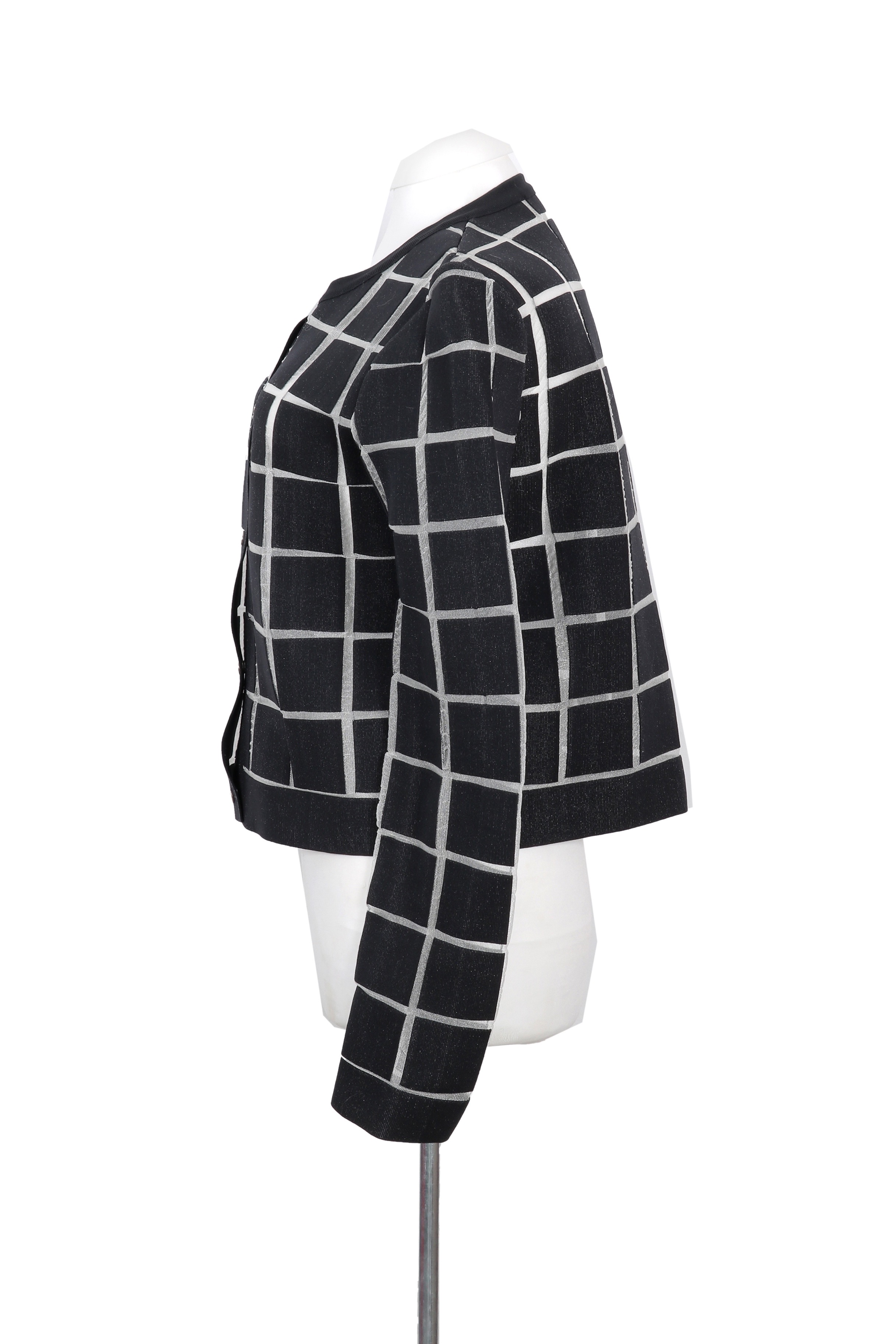 A Balenciaga jacket featuring a bold black-and-white windowpane check pattern