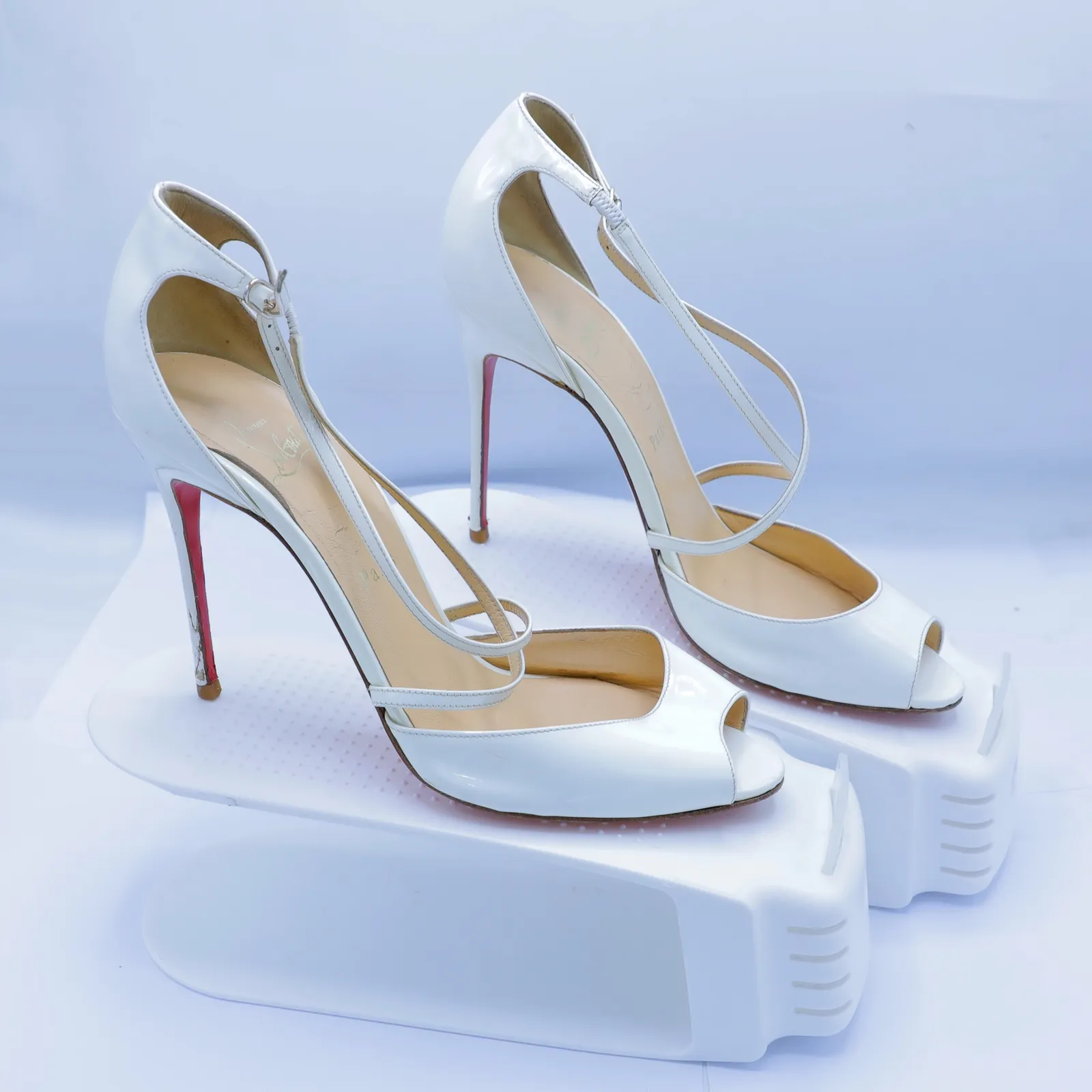 Christian Louboutin White Patent Leather Pumps