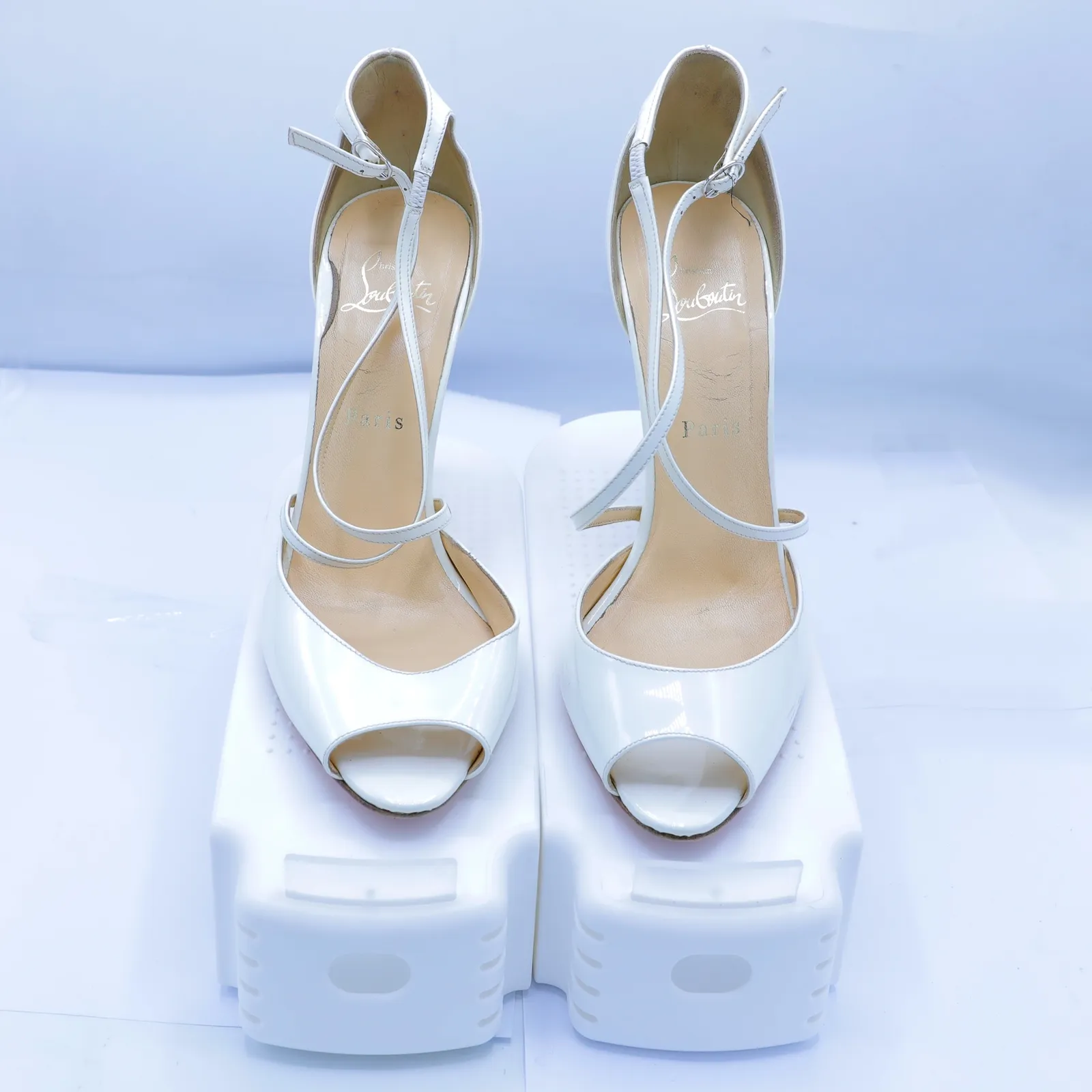 Christian Louboutin White Patent Leather Pumps
