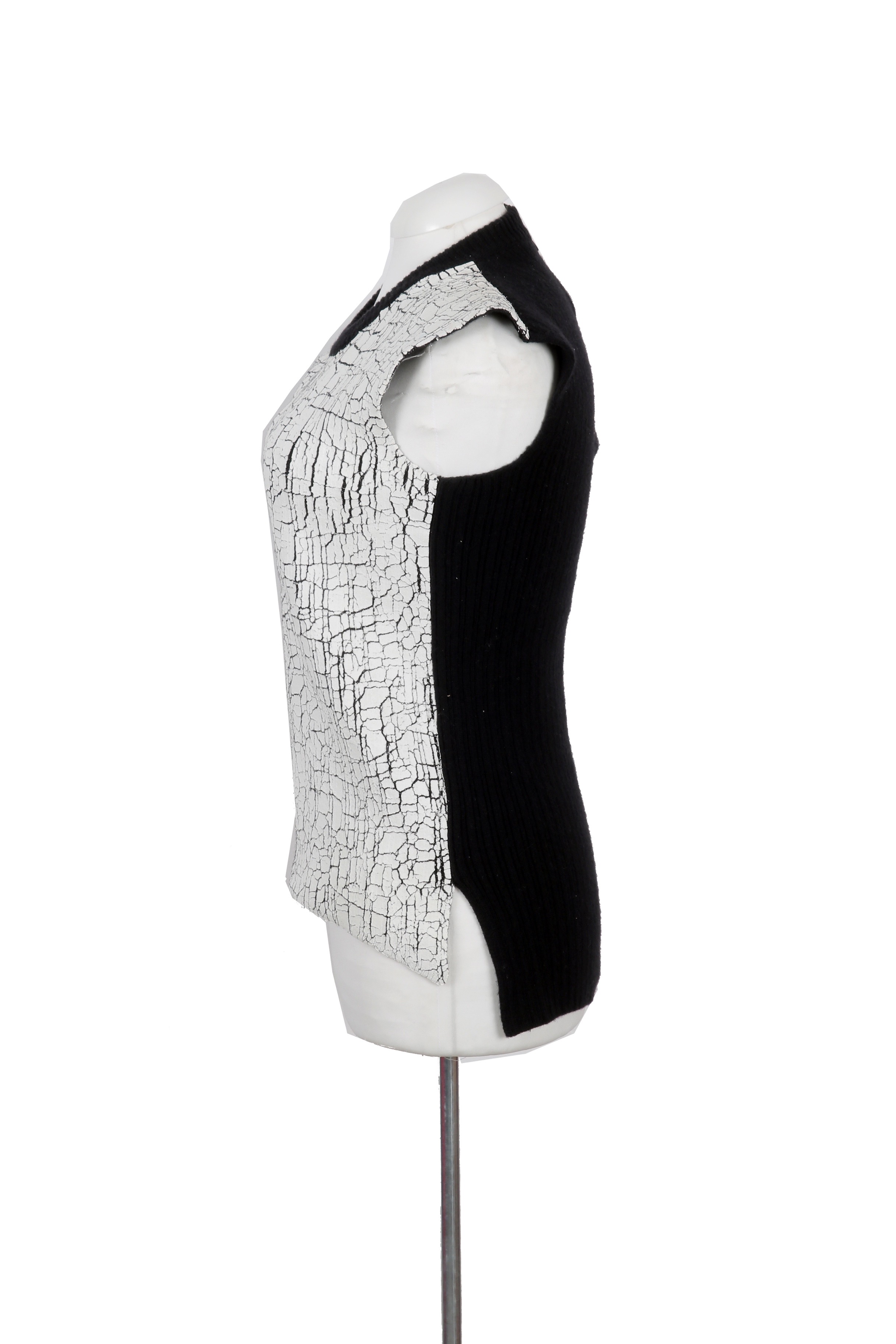 Balenciaga sleeveless sweater vest featuring a white cracked-paint effect with a modern, artistic finish