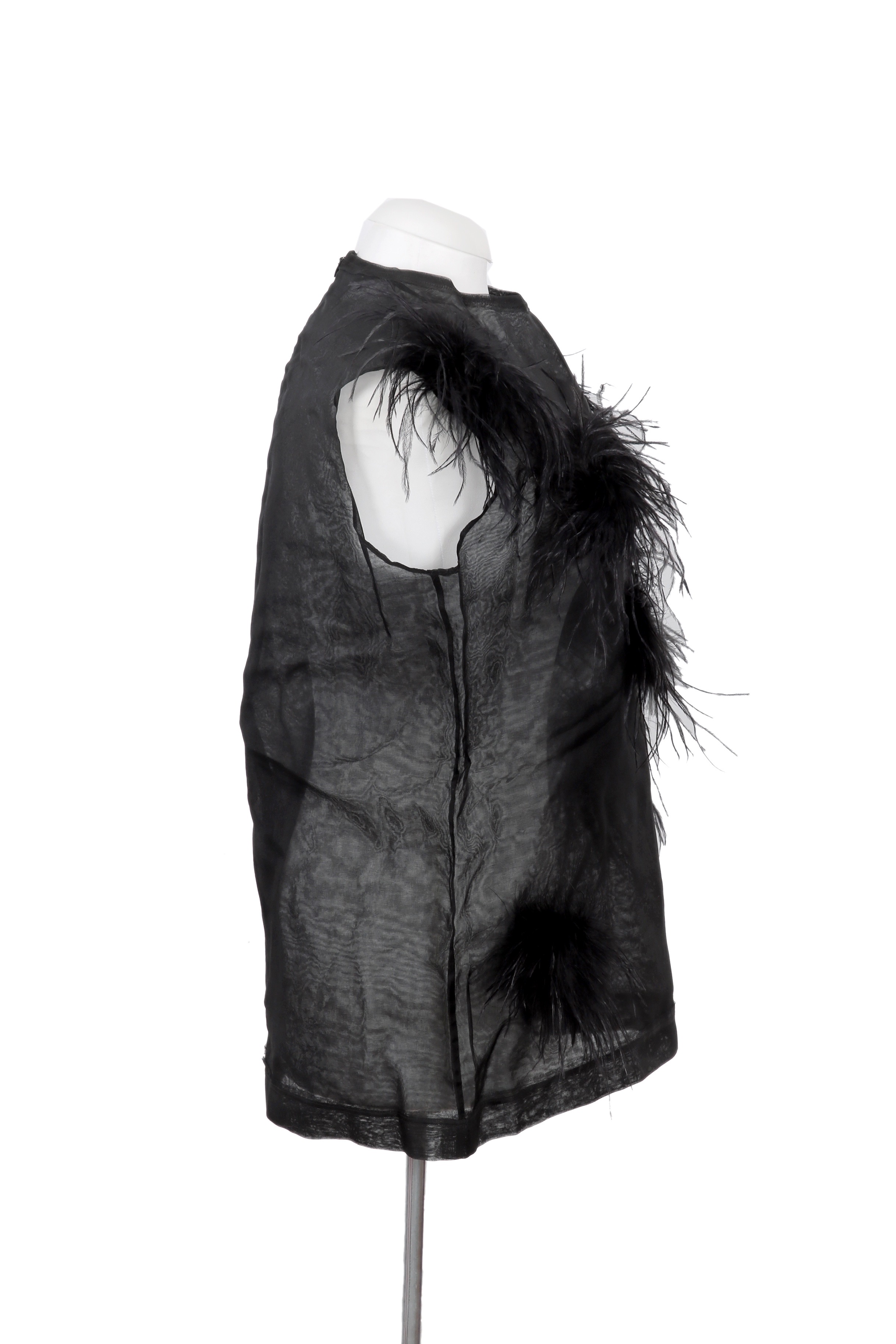 Sheer black polyamide top by Peet Dullaert, accented with dramatic feather embellishments for a bold, avant-garde statement